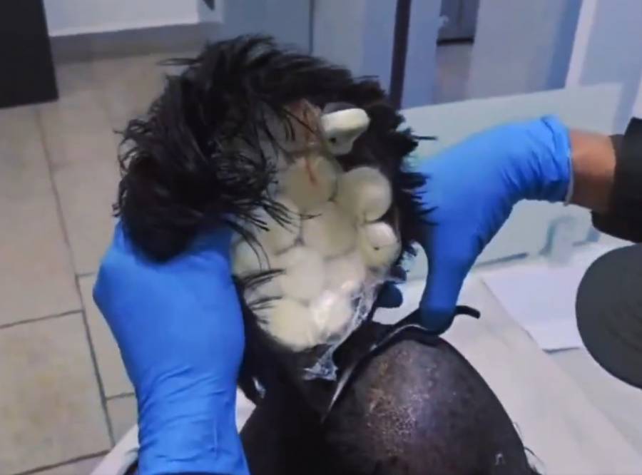 Detienen a hombre en aeropuerto de Cartagena intentando transportar coca&iacute;na en una peluca